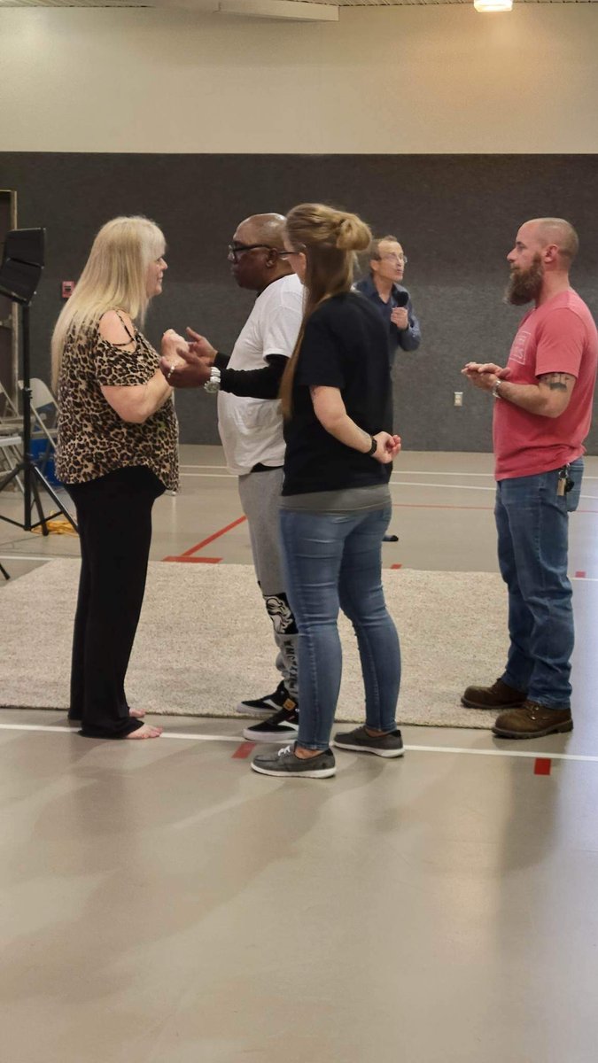Group of church members in conversation after service