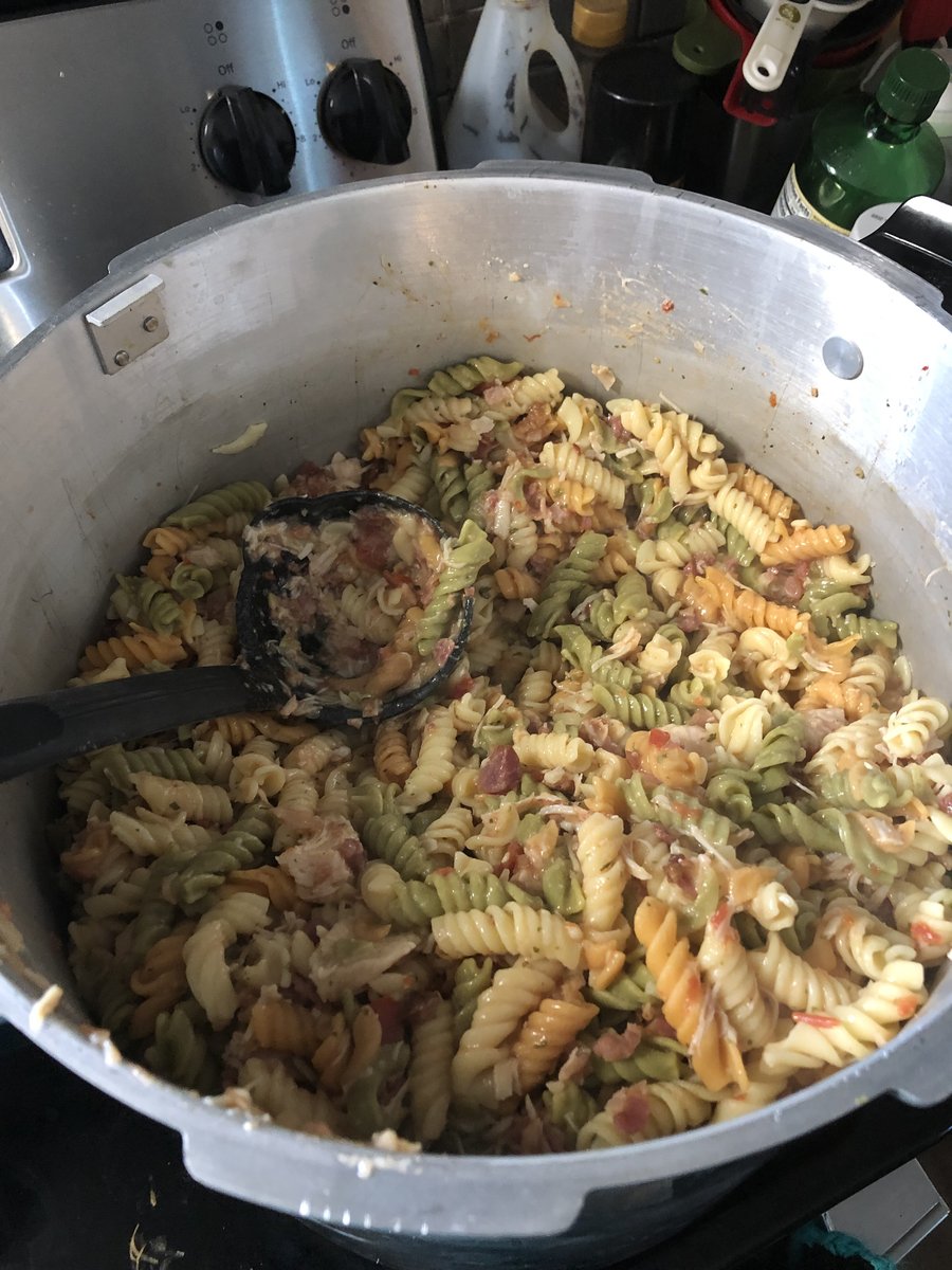 Large pot of pasta being prepared for street outreach meals