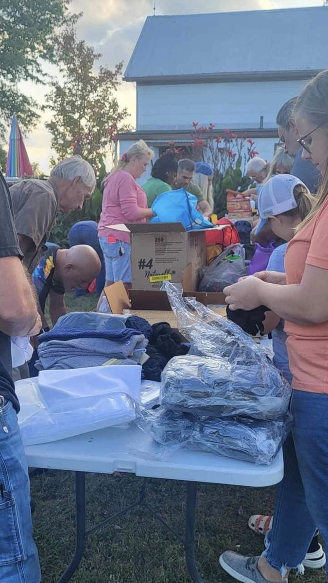 Volunteers packing hygiene bags and supplies for people on the streets