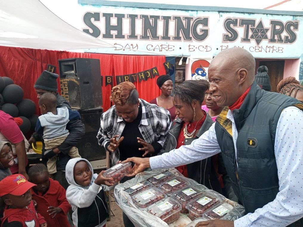 NFM team distributing gifts at the Shining Stars day care center